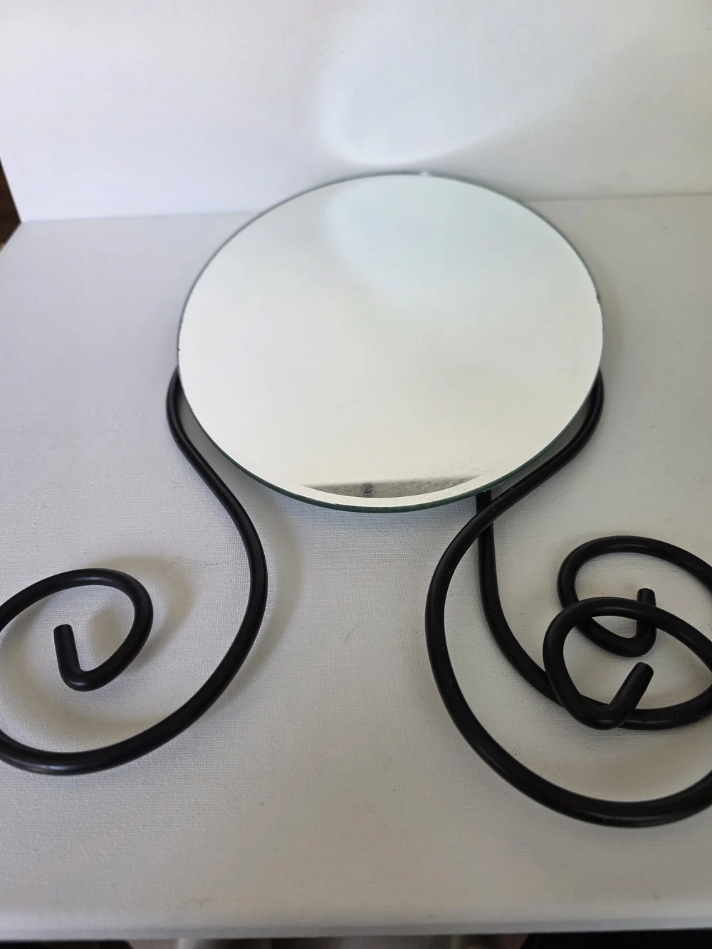 Vintage 1999 Myken Round Vanity Mirror with Black Scroll Frame
